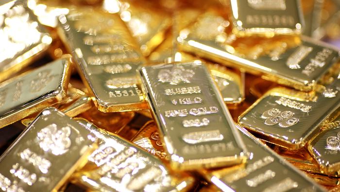 Цены на золото достигли 14-месячного максимума на фоне украинского кризиса и падения реальной доходности