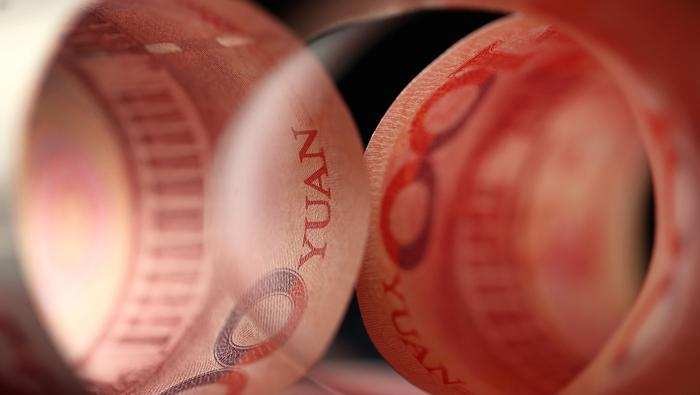 Chinese Yuan Breaking News: CNH Under Pressure as FX Reserves Slump to Yearly Lows