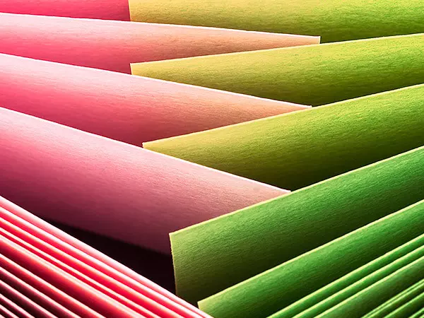 Interlocking pink and green papers